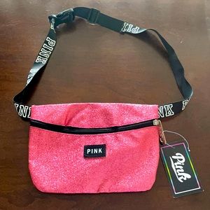 2 shirts headband 2 pink bows a pink Fanny pac